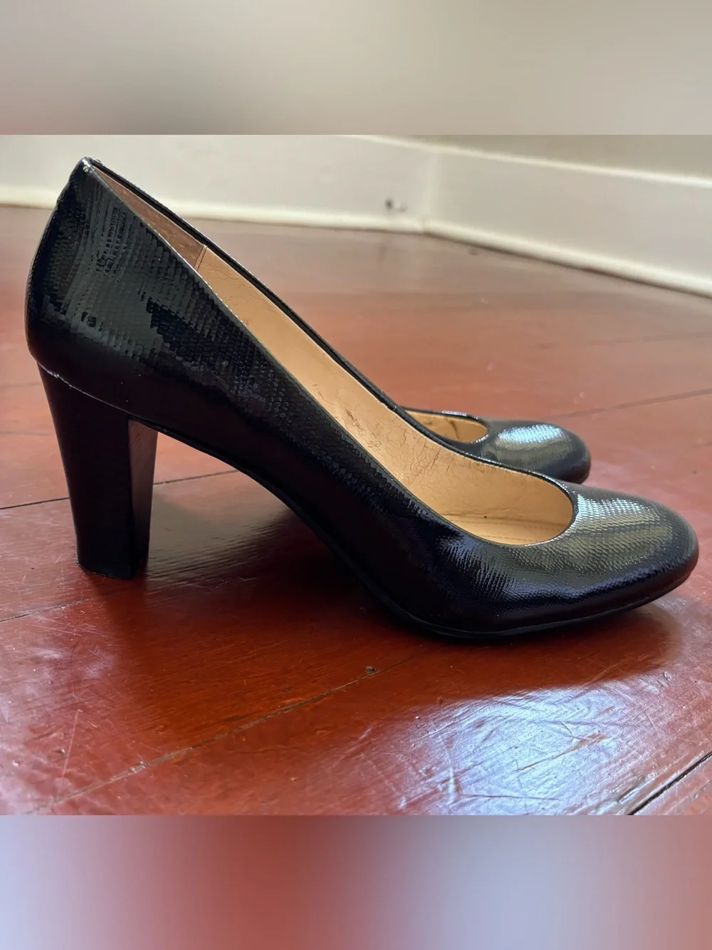 CK Women’s faux snake skin pumps